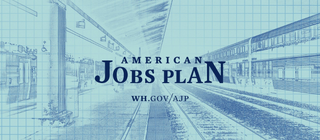 Blaupause einer Bahnhof mit der Aufschrift "American Jobs Plan" und einem Zug auf der rechten Seite.
